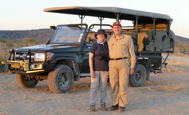 Photo from June, 1994 of Harry Doenlen and Liz Doenlen on their honeymoon in Kenya. There are standing next to a sign showing it is the  Equator.